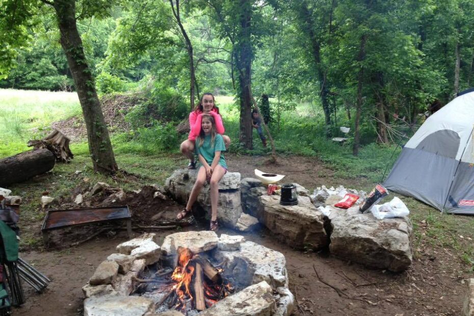 girls around campfire